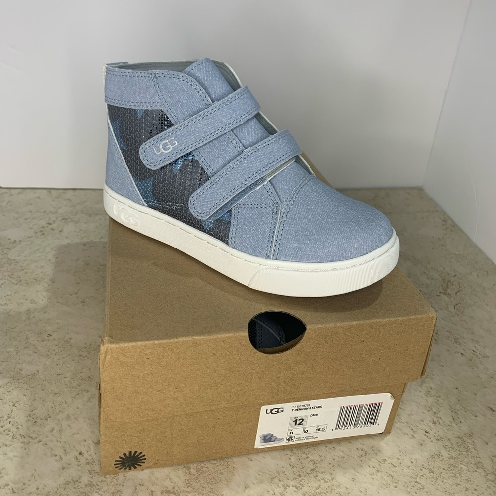 Girls size 12 Ugg shoes. New, never worn in box.